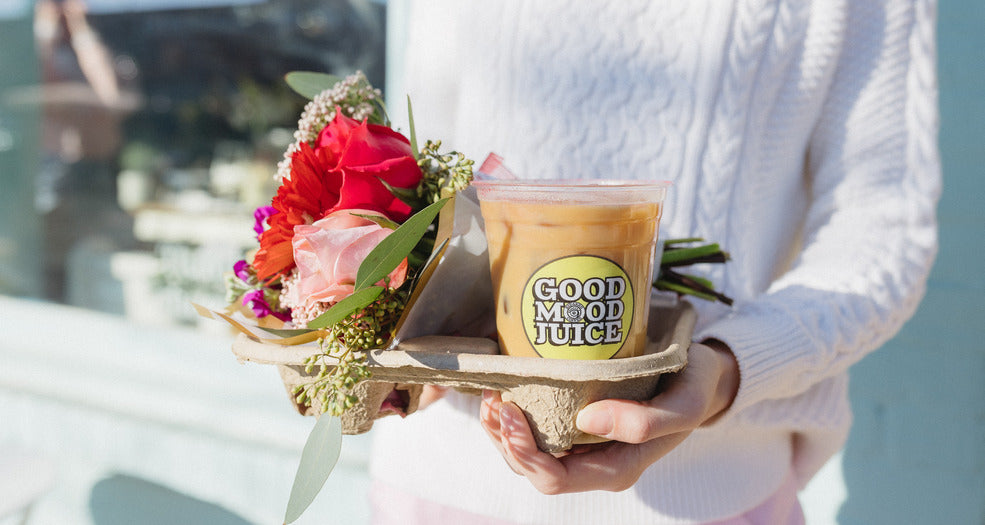 A flower bouquet & iced latte.